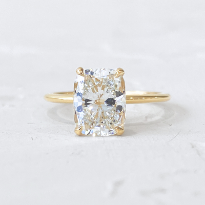 Rose | Elongated Cushion cut Solitaire Engagement Ring with a Subtle Diamond Wrap