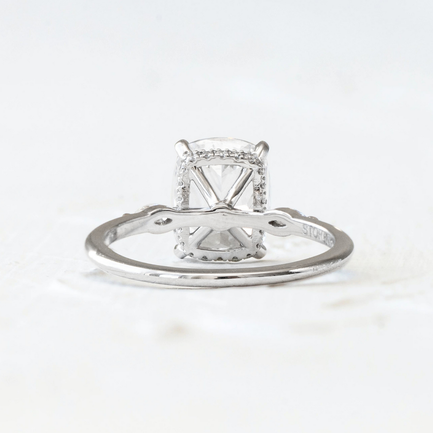 Ash | Raised Centre Stone with Marquise side details and Hidden Diamond Wrap