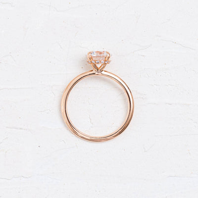 Rose | Round Solitaire Diamond Engagement Ring with a Subtle Diamond Wrap
