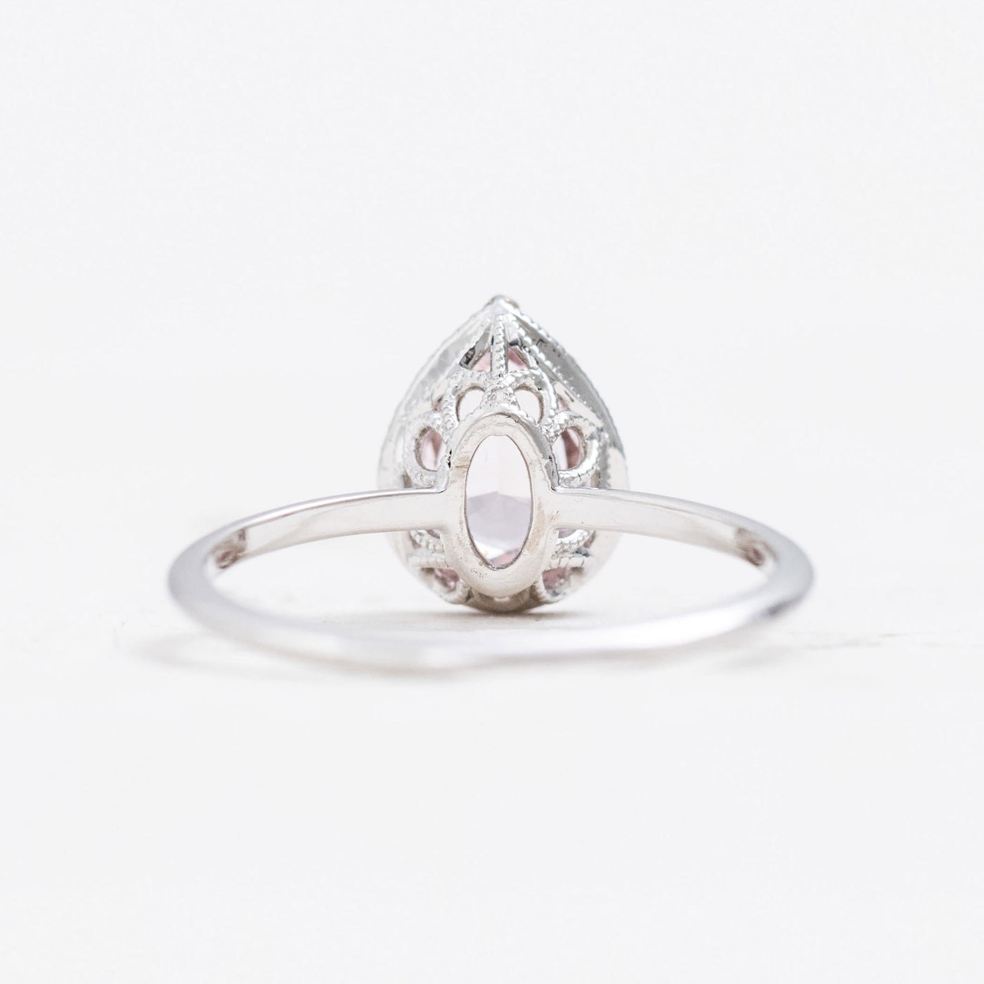 Ava | Partially Hidden Diamond Halo Surrounds Your Choice of Stone Shape