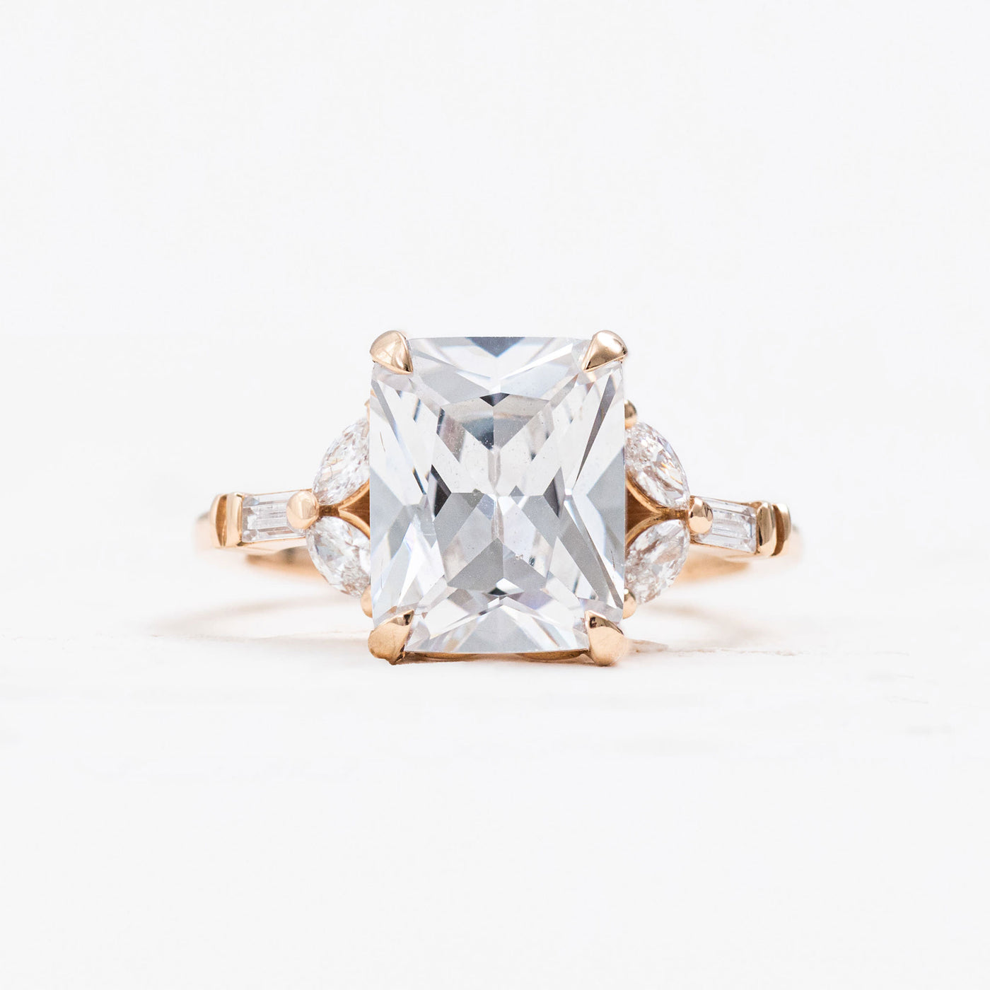 Blair | Emerald or Radiant cut Diamond Solitaire with Marquise and Baguette Diamond side details